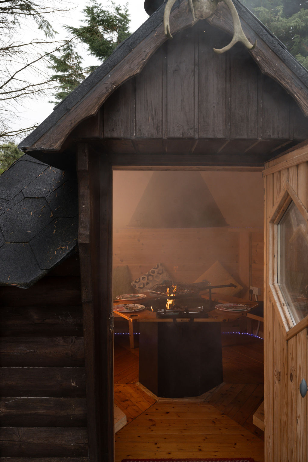 A warm fire inside the BBQ hut
